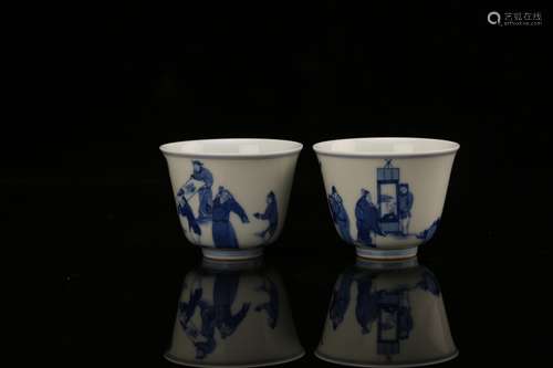 Pair of Chinese blue and white porcelain cups, Kangxi mark.