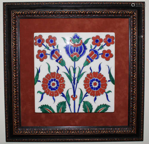 Framed Iznik pottery tile.