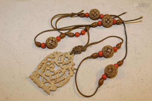 Chinese carved bead necklace.