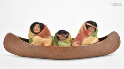 3 Indian Skookum Dolls: in canoe