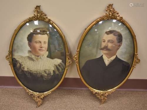 Pair of Hand colored Photographs in Gilt Frames