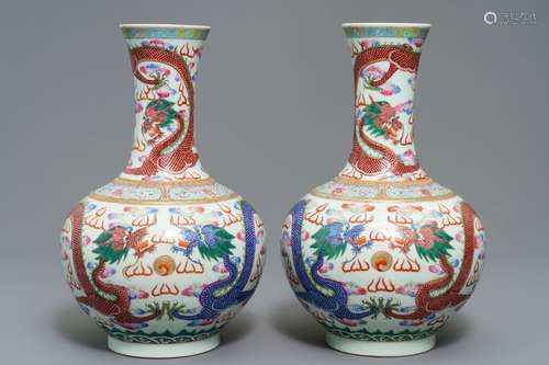 A pair of Chinese famille rose 'dragon' vases, Guangxu mark and of the period