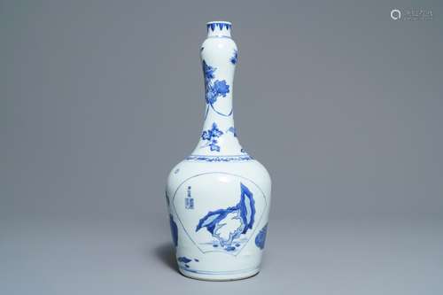 A Chinese blue and white bottle vase with inscription, Transitional period