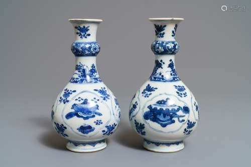 A pair of Chinese blue and white bottle vases, Kangxi