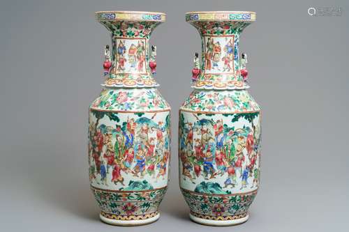 A pair of Chinese famille rose lady-handle vases, 19th C.