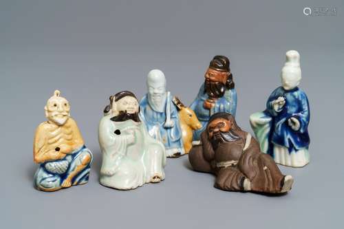 Six Chinese blue, white and celadon biscuit figures, Qianlong