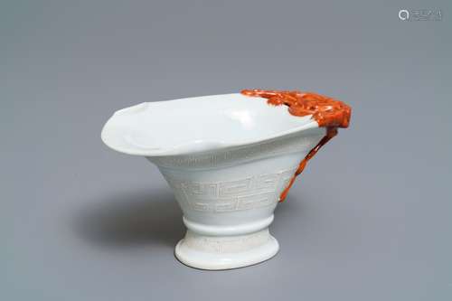 A Chinese 'bianco sopra bianco' and iron red libation cup, 19th C.