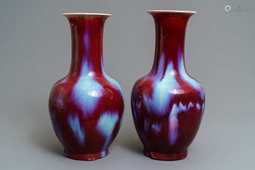 A pair of fine Chinese sang de boeuf and flambé-glazed vases, 19/20th C.