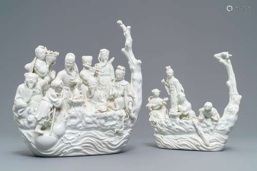 Two Chinese Dehua blanc de Chine groups with immortals on log boats, 19th C.