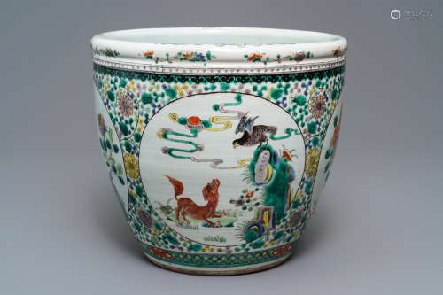 A Chinese famille verte 'mythical beasts' fish bowl, 19th C.