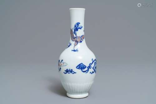 A Chinese blue, white and underglaze red 'dragon' vase, Kangxi