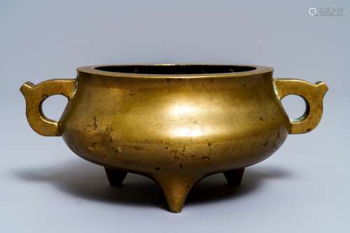 A Chinese bronze tripod censer, Qianlong mark, 19th C.