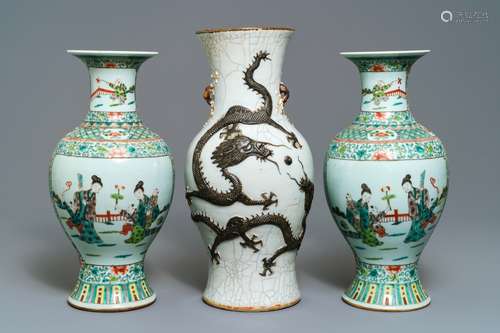 A pair of Chinese famille verte vases and a Nanking 'dragon' vase, 19th C.