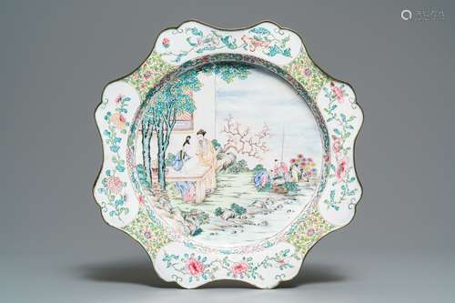 A large Chinese Canton enamel charger with figures in a garden, Yongzheng