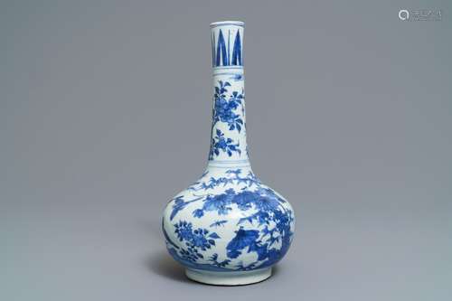 A Chinese blue and white bottle vase with birds in a landscape, Wanli