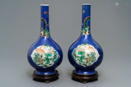 A pair of Chinese famille verte powder blue-ground bottle vases, 19th C.