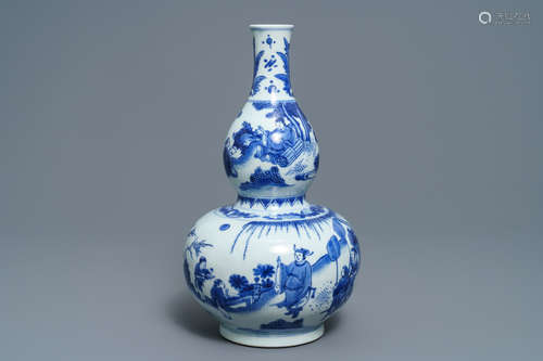 A Chinese blue and white double gourd vase, Transitional period