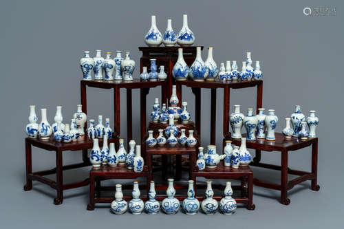 An impressive collection of 66 Chinese blue and white miniature vases, Kangxi