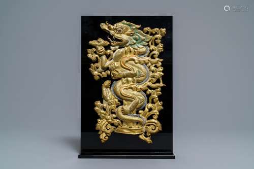 A gilt and polychromed copper repoussé torana 'dragon' fragment, Tibet, 17/18th C.