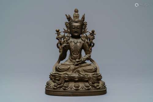 A Chinese bronze figure of Guanyin, Ming