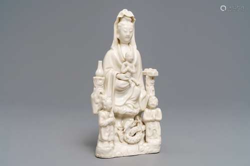 A Chinese Dehua blanc de Chine 'Guanyin with children 'group, Kangxi