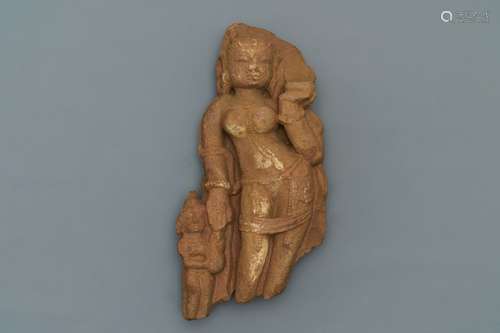 A red sandstone fragment of a Yakshi, India, 14th C. or later