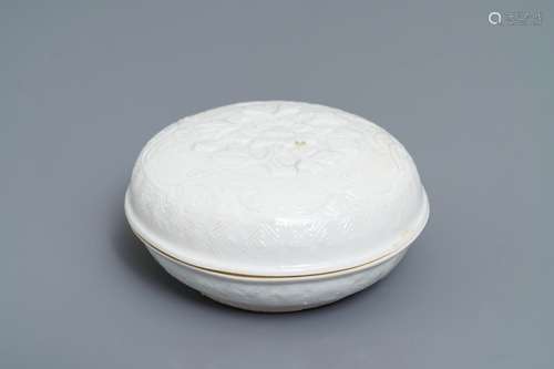 A Chinese Dehua blanc de Chine relief-decorated box and cover, incised mark, Kangxi