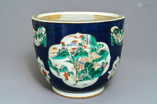 A Chinese blue-ground famille verte fishbowl, 19th C.