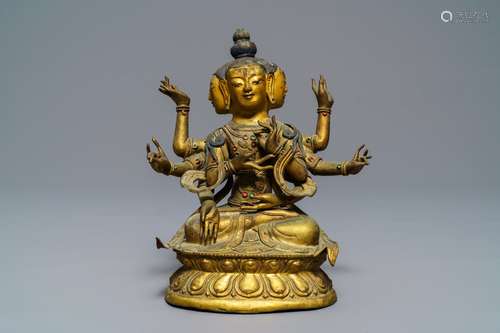 A Sino-Tibetan inlaid gilt copper alloy figure of Ushnishavijaya, 18th C.