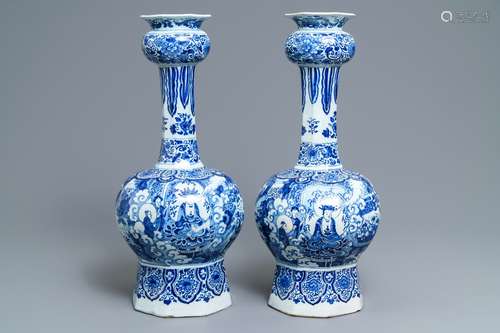 A pair of tall Dutch Delft blue and white chinoiserie vases, late 17th C.