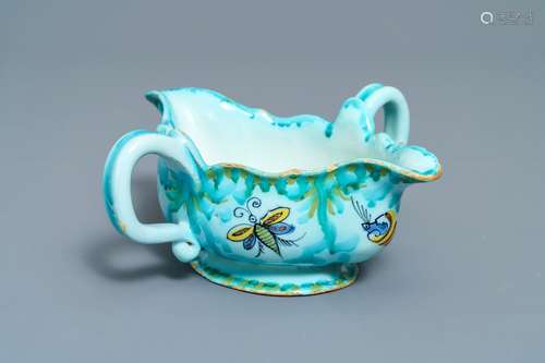 A Brussels faience sauce boat with butterflies and caterpillars, late 18th C.