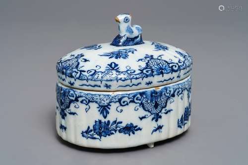 A Dutch Delft blue and white sheep-finial butter tub, 18th C.