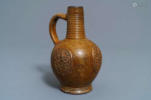 A Belgian stoneware armorial jug with CR monogram, Bouffioulx, 16/17th C.