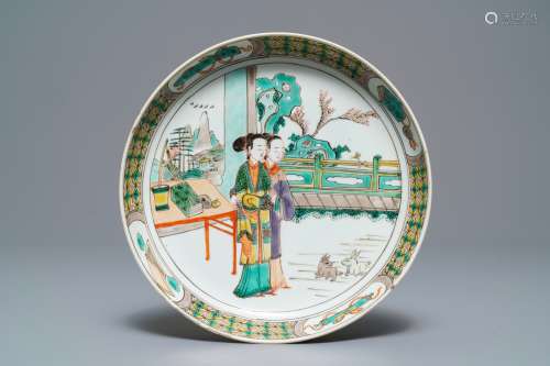 A Chinese famille verte 'Ladies and rabbits' plate, Kangxi