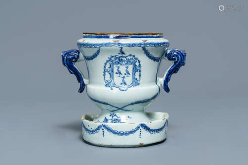 A Dutch Delft blue and white armorial 'campana' vase on stand, 18th C.