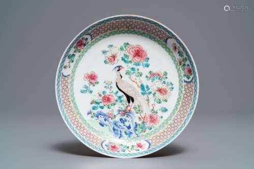 A fine Chinese famille rose 'ruby back' eggshell plate with a peacock, Yongzheng