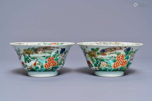 A pair of Chinese famille verte 'peacock among blossoms' bowls, Kangxi