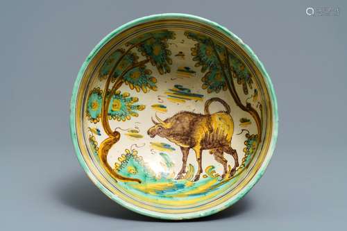 A large polychrome Spanish bowl with a bull, Talavera, 18th C.