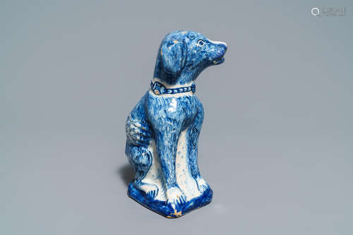 A Dutch Delft blue and white model of a dog, 1st half 18th C.