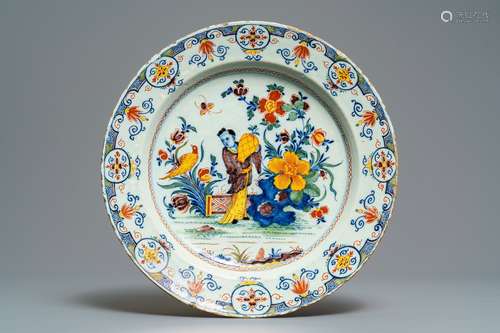 A polychrome Dutch Delft chinoiserie dish, early 18th C.