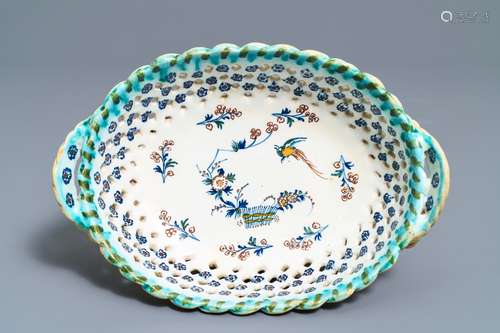 A polychrome Brussels faience 'A la haie fleurie' basket, 18th C.