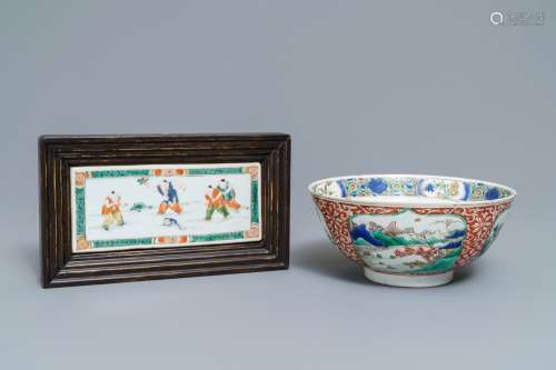 A Chinese famille verte plaque with playing boys and a landscape bowl, Kangxi