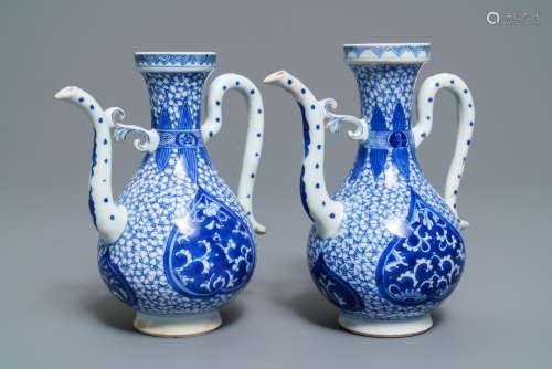 A pair of Chinese blue and white Islamic market jugs, Kangxi