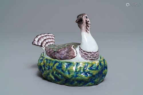 A polychrome Dutch Delft 'plover' butter tub and cover, 18th C.