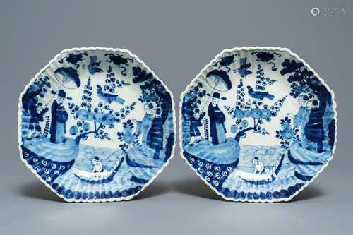 A pair of Dutch Delft blue and white fluted chinoiserie dishes, 18th C.