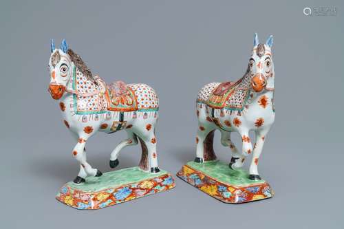 A fine pair of polychrome petit feu and gilded Dutch Delft models of horses, 1st half 18th C.