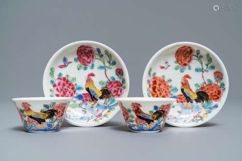 A pair of Chinese famille rose 'roosters' cups and saucers, Yongzheng/Qianlong