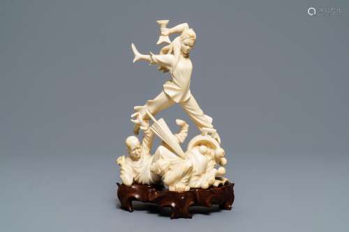 A Chinese ivory group with a fierce girl, ca. 1940