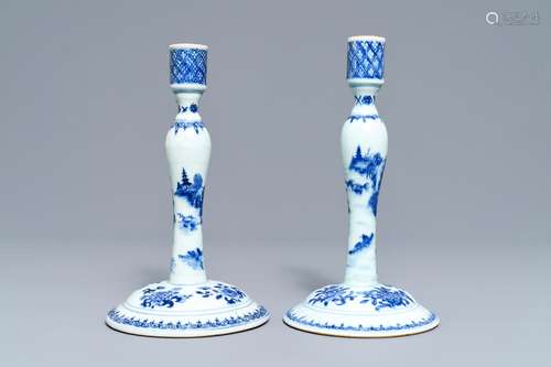 A pair of Chinese blue and white candlesticks, Kangxi/Qianlong