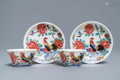 A pair of Chinese famille rose 'roosters' cups and saucers, Yongzheng/Qianlong